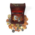 Wooden treasure box filled with uncirculated mix of world coins and 1 Ancient Roman coin pictured on top
