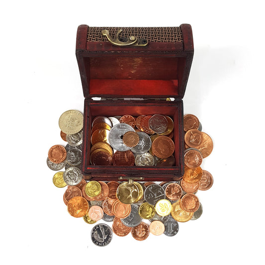 Wooden treasure box filled with uncirculated mix of world coins and 1 Ancient Roman coin pictured on top